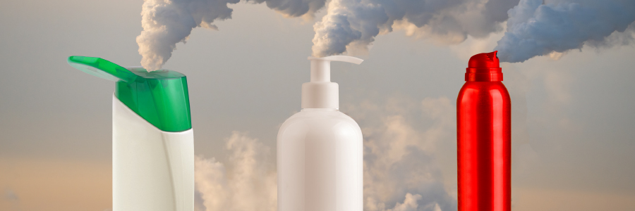 Image of body care bottles and clouds of emissions