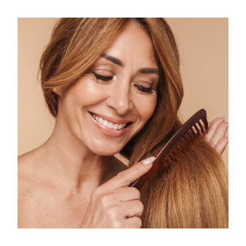 Image of a person brushing their hair
