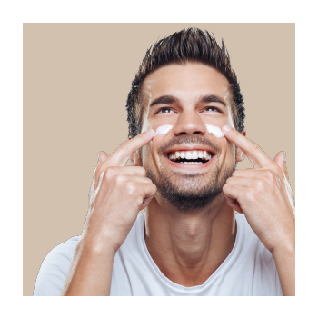 Person applying ointment to face