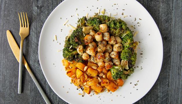 Natural Grocers Brown Butter Glazed Scallops Served with Roasted Broccoli and Butternut Squash Bites